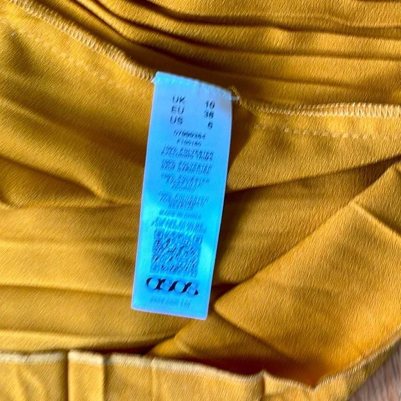 Wrap up asymmetrical pleated skirt - Picture 8 of 8